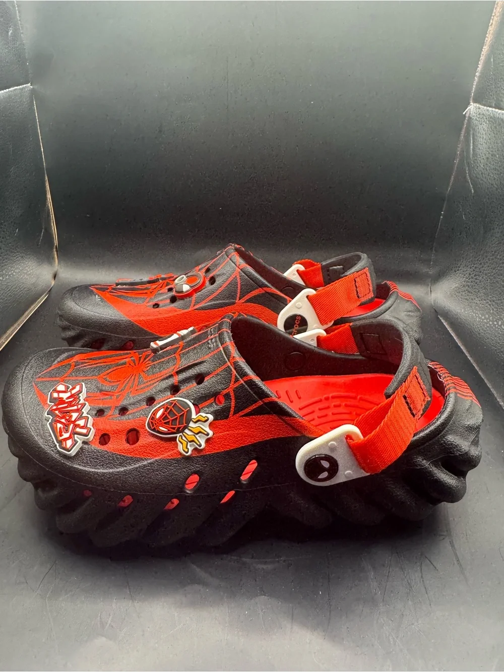 CROCS Kids Red and Black Spider Graphic Clog Sandals